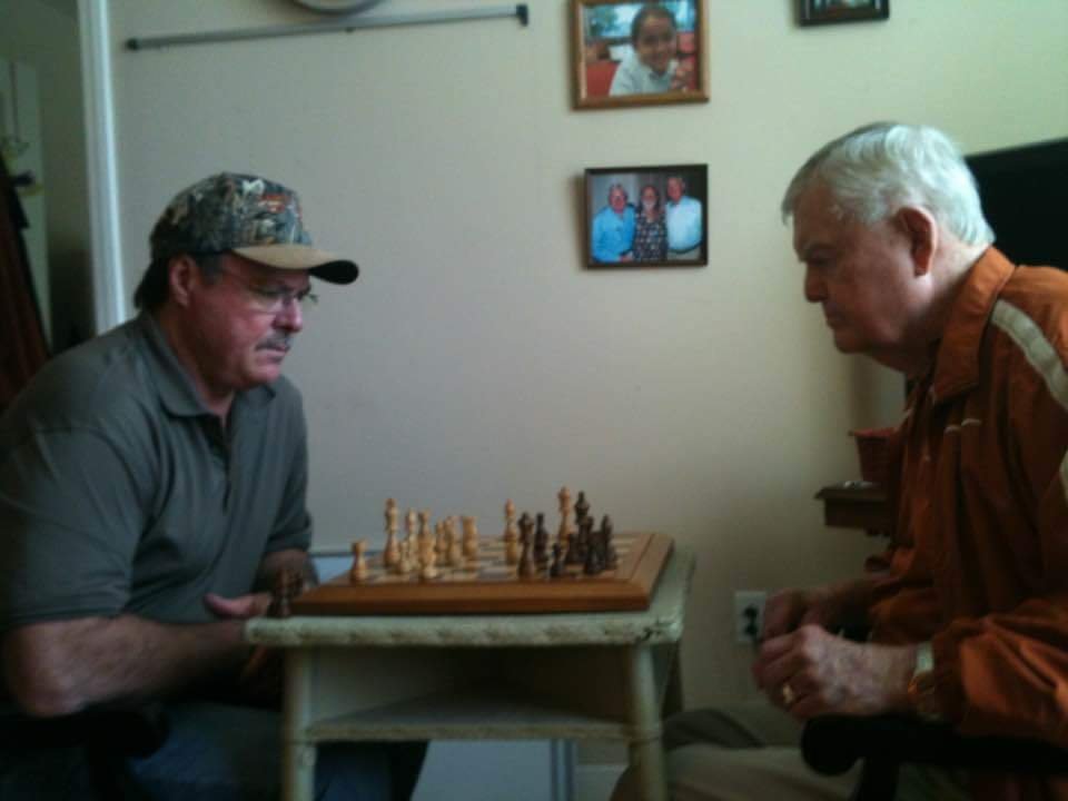 1975 Mark Akins and DKR playing chess.jpg