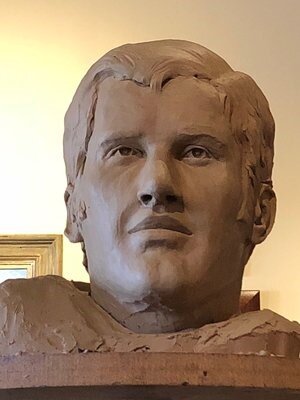 Clay model of Pending bronze bust that will be on display in the South End Zone