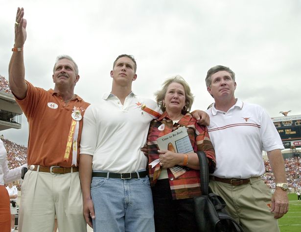 The Pittman family with Coach Brown