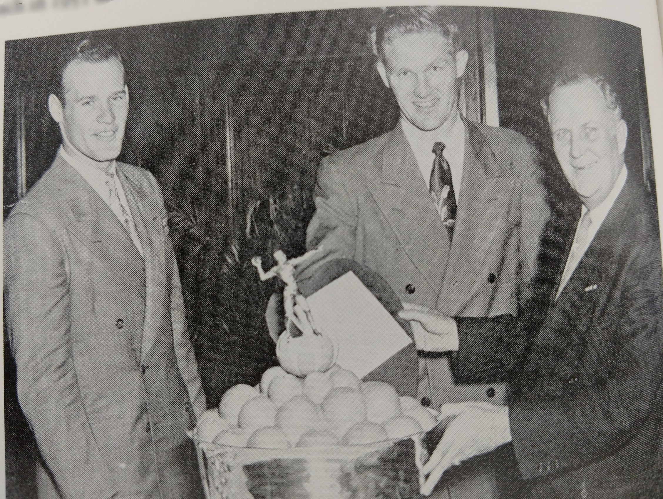 Orange Bowl Trophy presented to Tom Landry and Dick Harris after defeating Georgia