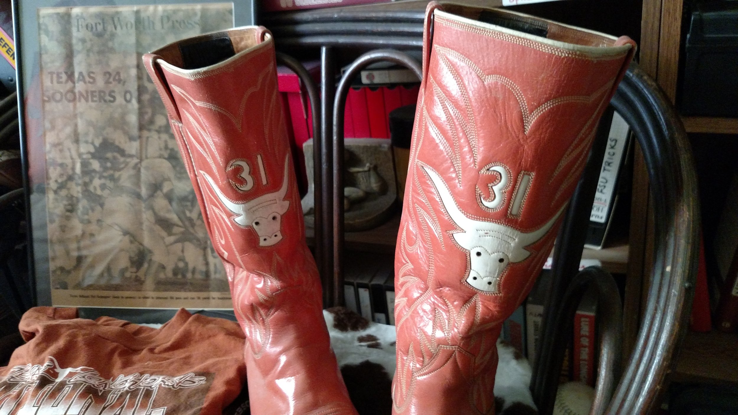  Photo of Pat’s boots taken in his home. Notice the Sooner score on the back wall.  