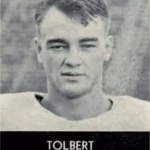 1934  Jim Tolbert hits a referee and has his varsity letter withheld